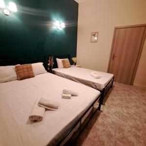 Ένα ή περισσότερα κρεβάτια σε δωμάτιο στο Central Piraeus port apartment +20 φωτογραφίες