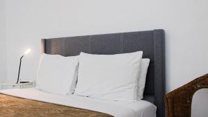 Postel nebo postele na pokoji v ubytování Arecibo Hotel 2103