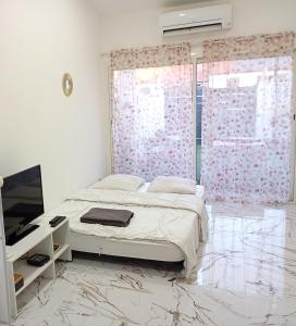 Katil atau katil-katil dalam bilik di Modern guest house