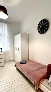 Łóżko lub łóżka w pokoju w obiekcie Beautiful Rooms - Wały Chrobrego