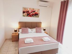 Posteľ alebo postele v izbe v ubytovaní Apartman Dalibor, Stanići - Omiš