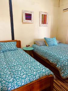 Hostal María Lucía客房内的一张或多张床位