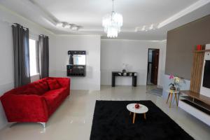 Χώρος καθιστικού στο Casa confortavel com WiFi, piscina e churrasqueira