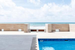 una casa en la playa con piscina en Xaman Ha Villa 30- PlayaCar- phase I, en Playa del Carmen