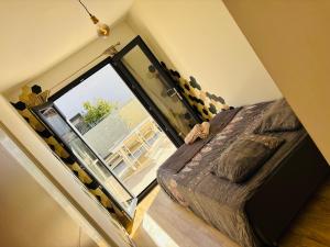 Ένα ή περισσότερα κρεβάτια σε δωμάτιο στο Villa avec jacuzzi en petite camargue +10 φωτογραφίες
