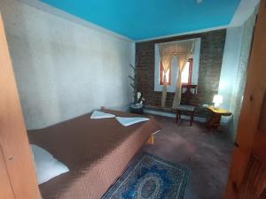 Voodi või voodid majutusasutuse Casa Pukyu Pata toas