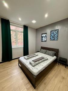 Ένα ή περισσότερα κρεβάτια σε δωμάτιο στο The Rainbow 10