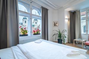 Ένα ή περισσότερα κρεβάτια σε δωμάτιο στο Royal Road Residence