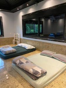 Postel nebo postele na pokoji v ubytování Casa de Pedra Espaçosa na Fazenda