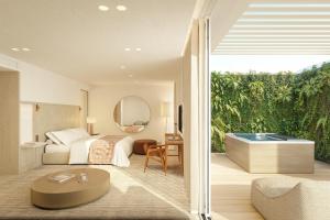 a hotel room with a bed and a tub at Villa Dubrovnik in Dubrovnik