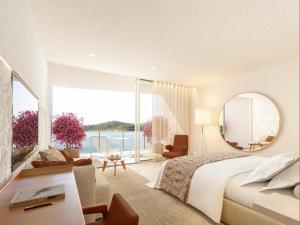 a bedroom with a large bed and a large window at Villa Dubrovnik in Dubrovnik