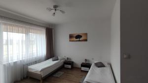 Posteľ alebo postele v izbe v ubytovaní Hotel Mława