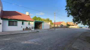 El barrio en el que está la casa vacacional o un barrio cercano