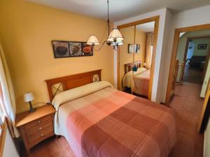 Postel nebo postele na pokoji v ubytování CASA RURAL EL CAIDERÓN