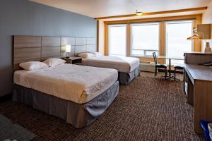 Cama o camas de una habitación en Ramada by Wyndham Cranbrook