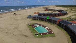 an aerial view of a resort on the beach at Chacras del Mar 4x4 in Mar Azul