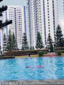 La alberca dentro o cerca de LOVELY Place TAGAYTAY