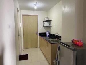 Una cocina o cocineta en LOVELY Place TAGAYTAY