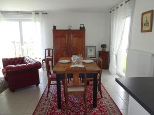 Posedenie v ubytovaní Comfortable holiday home with garden, near beach + 14 fotografií