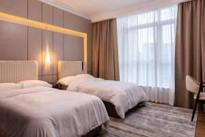 Postel nebo postele na pokoji v ubytování Nile pearl Cairo Maadi Apartment luxury