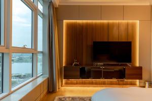 TV a/nebo společenská místnost v ubytování Nile pearl Cairo Maadi Apartment luxury