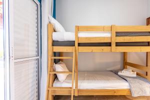 Giường trong phòng chung tại Piscina, churrasqueira, natureza - Brazilian Corner