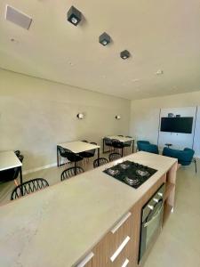 Nhà bếp/bếp nhỏ tại Icon - Conforto e Comodidade- Melhor Localização de Chapecó +3 ảnh