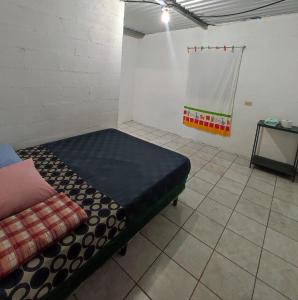 Postel nebo postele na pokoji v ubytování Casa Campo Loma Larga