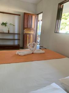 Postel nebo postele na pokoji v ubytování Suites noach beach