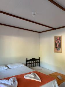 Postel nebo postele na pokoji v ubytování Suites noach beach