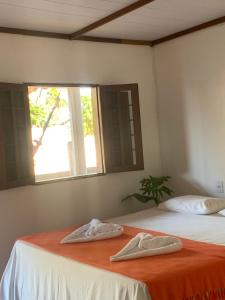 Postel nebo postele na pokoji v ubytování Suites noach beach