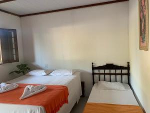 Postel nebo postele na pokoji v ubytování Suites noach beach