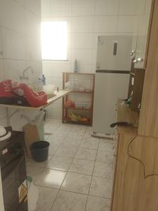 Η κουζίνα ή μικρή κουζίνα στο Apartamento mobiliado