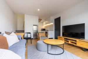 a living room with a couch and a table at Adventure's Retreat in Albert Town