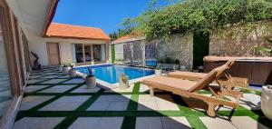 Gallery image of Villa Frangepani, Private Pool, 3 Bedroom, 2 Bath, Fully Equipped, Billiard Table, Home theatre, at Sumba Paradise Bech Resort in Lakahembi