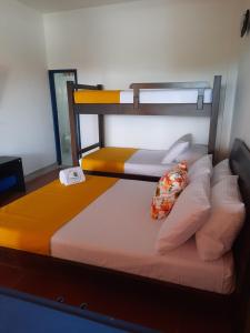 Postel nebo postele na pokoji v ubytování Ecohotel Guaduales Nature