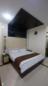 Katil atau katil-katil dalam bilik di griya desa hotel & pool