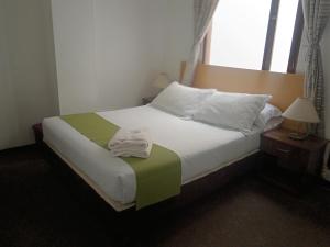 Postel nebo postele na pokoji v ubytování Hotel del Parque Confort LaCeja