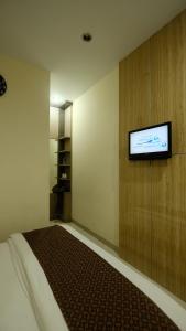 Katil atau katil-katil dalam bilik di griya desa hotel & pool