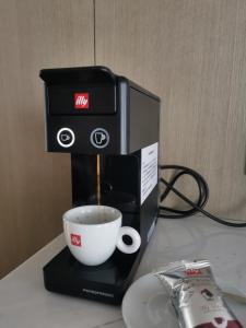 Oprema za pripravo čaja oz. kave v nastanitvi 温州华侨饭店柏宴店