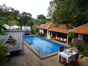 an image of a swimming pool in a house at Neang Aun Kep in Kep