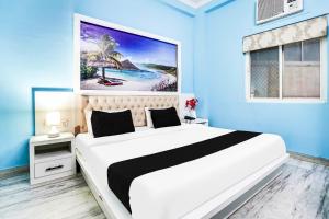 Postel nebo postele na pokoji v ubytování Super Hotel O Vaishali Nagar
