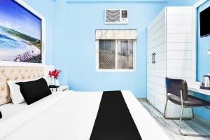 TV a/nebo společenská místnost v ubytování Super Hotel O Vaishali Nagar