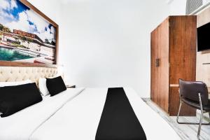 TV a/nebo společenská místnost v ubytování Super Hotel O Vaishali Nagar