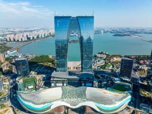 an aerial view of a city with tall buildings at W Suzhou - Jinji Lake in Suzhou