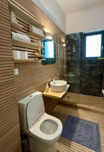 Ένα μπάνιο στο Apartments sunshine A1