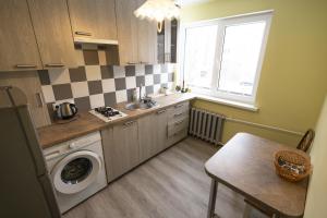 Kuchyň nebo kuchyňský kout v ubytování Peaceful flat + 6 fotografií