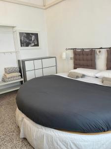 Postel nebo postele na pokoji v ubytování B&B Cristina e Stefano