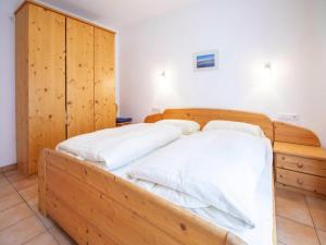 Posteľ alebo postele v izbe v ubytovaní Chalet in Filzsteinalpe near Ski Slopes