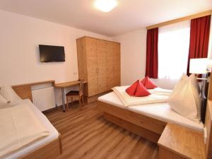 Voodi või voodid majutusasutuse Apartment in Sankt Johann near Ski Area toas